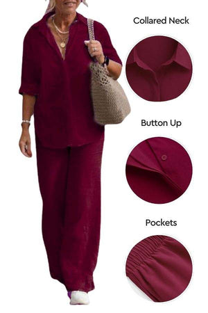 Woman wearing relaxed shirt and trousers two-piece set in burgundy with collared neck, button-up front, and pockets.