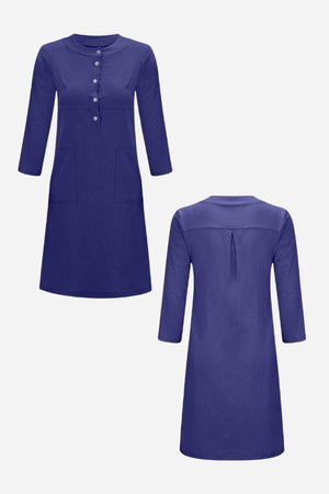 Blue cotton dress with 3/4 sleeves, half-button front, and practical pockets, shown front and back view