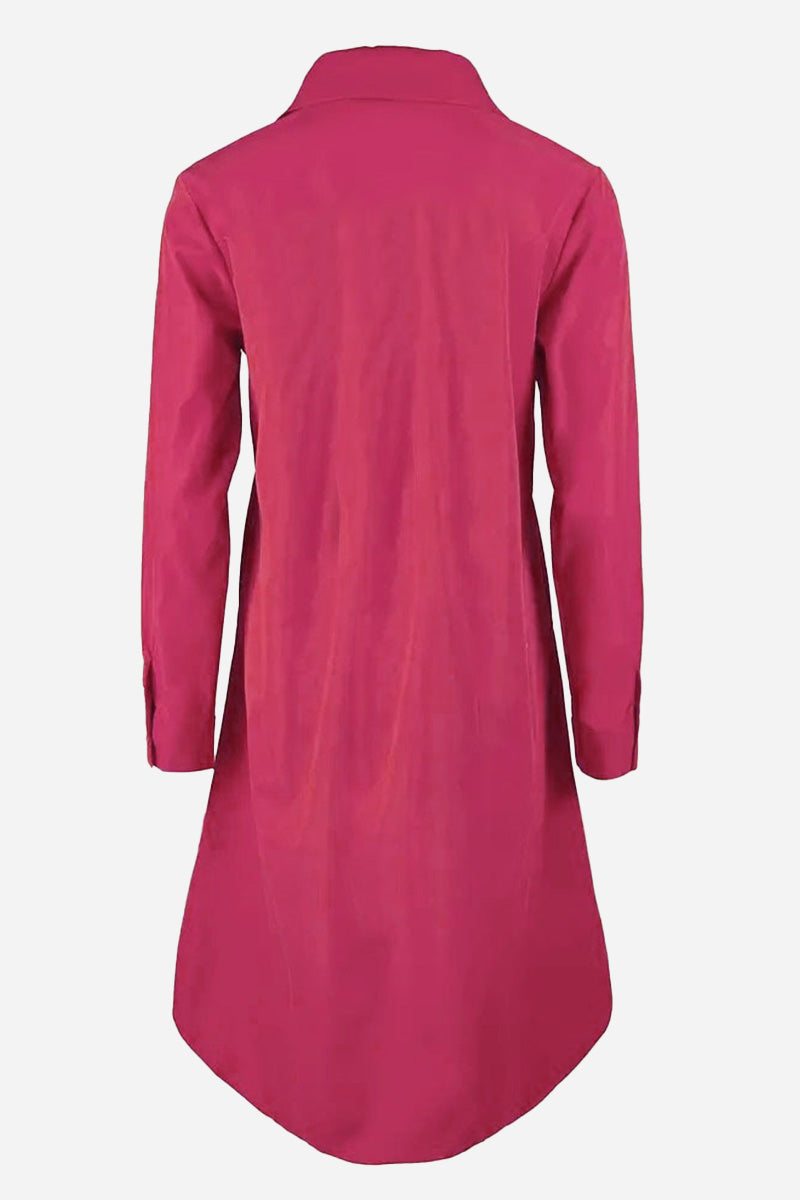 Back view of a vibrant pink long shirt-style dress with long sleeves and collar on plain background