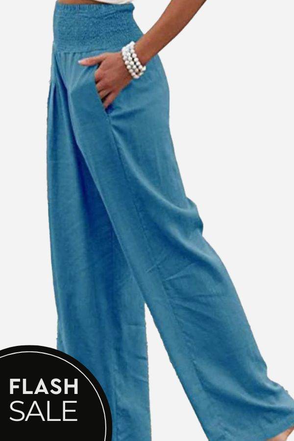High-waist polyester palazzo pants with wide legs and pockets for versatile styling and comfort
