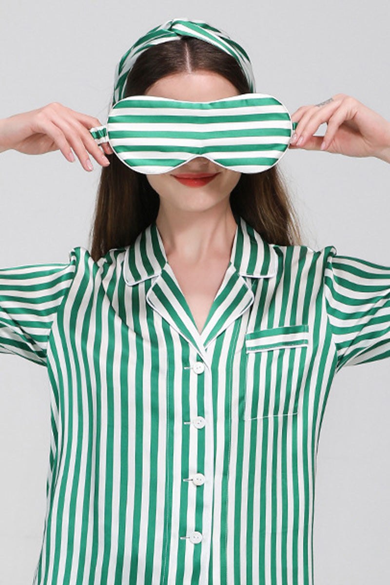 Woman wearing green and white striped mulberry silk pajama top and matching eye mask