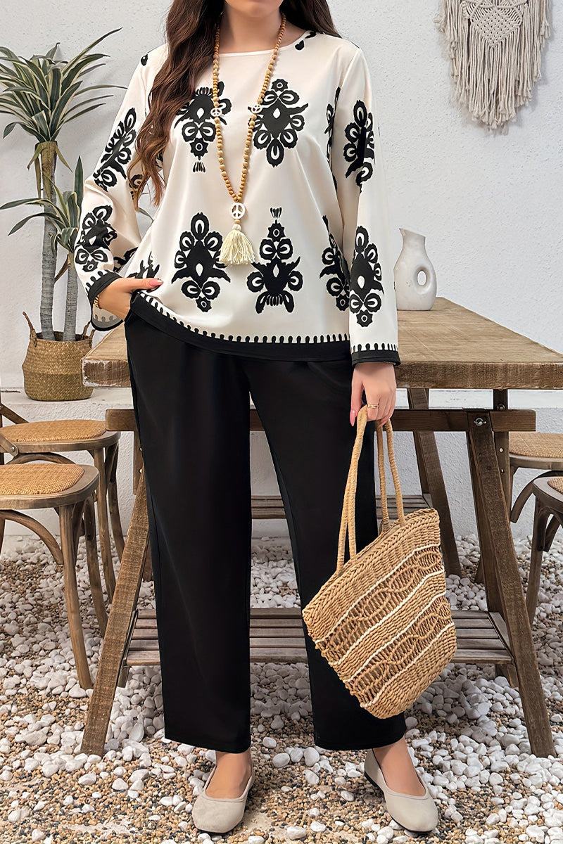 Plus Size Easy Elegance set featuring a black and white patterned long sleeve top and black pants with a relaxed fit and comfortable stretch fabric.