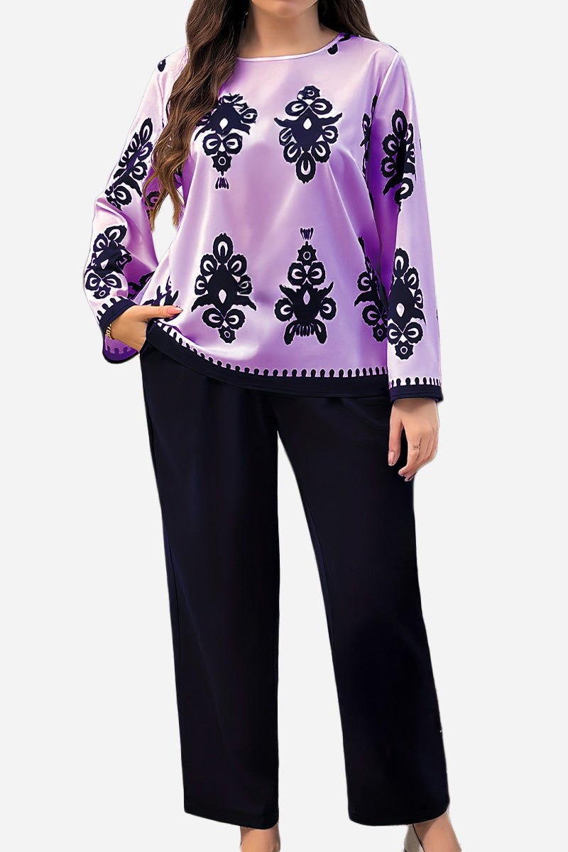 Plus Size Easy Elegance set with lavender and black printed top and black pants, soft stretch fabric, loose fit, long sleeves.