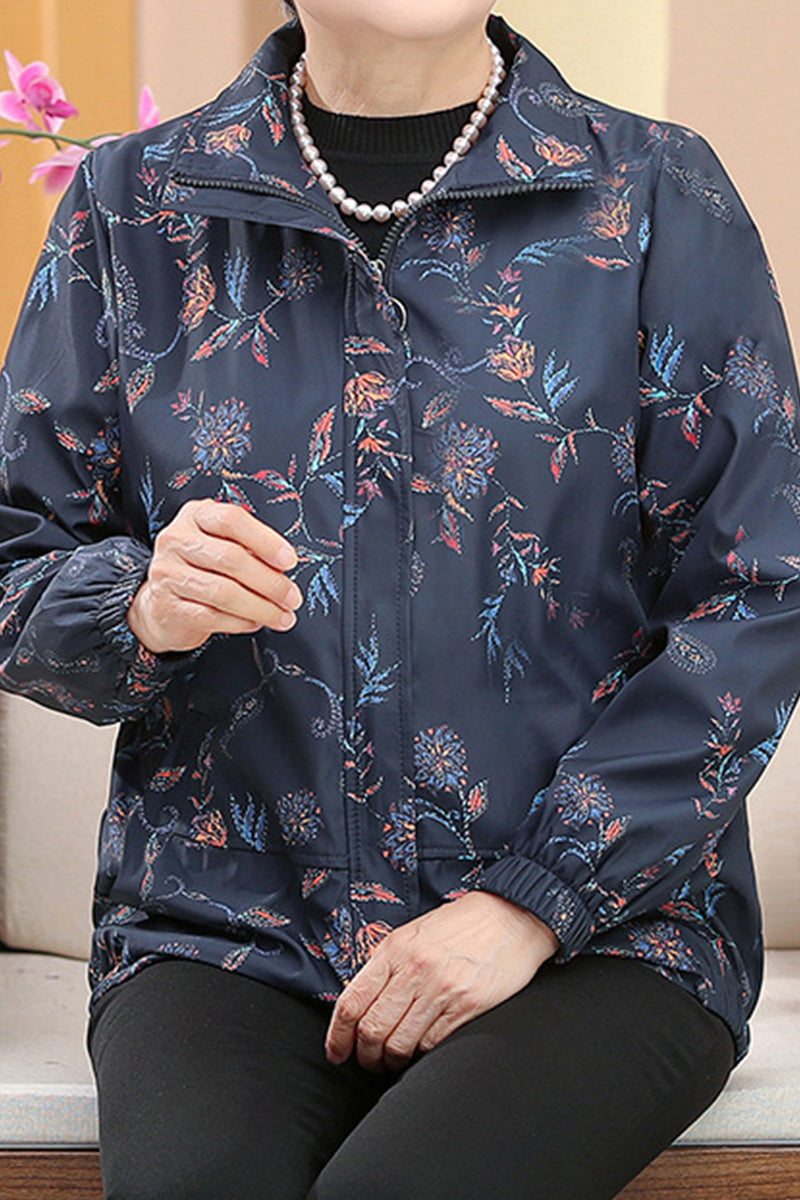 Plus Size WeatherShield floral jacket with water-resistant fabric and wind protection, featuring a lightweight, packable design in XL to 4XL sizes.