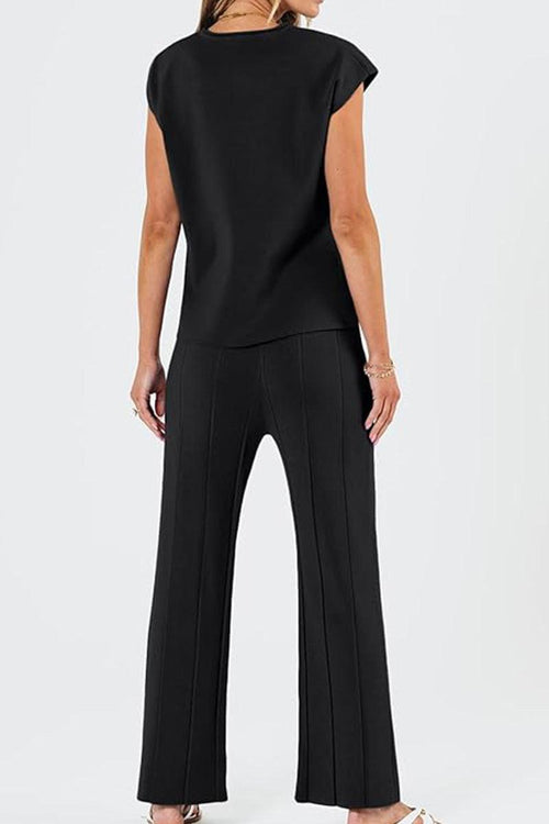 First Class Travel black two-piece set with pleated wide-leg pants and short sleeve top, wrinkle-resistant comfort for travel and everyday wear