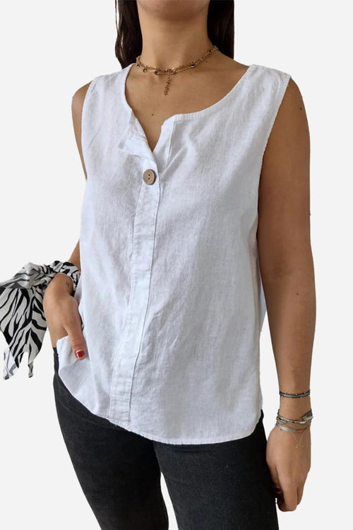 White 100% pure linen sleeveless vest with button detail and relaxed fit on a model