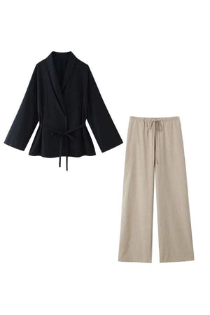 women's mix-match lounge-to-travel set with black wrap top and khaki wide-leg pants in comfortable polyester fabric