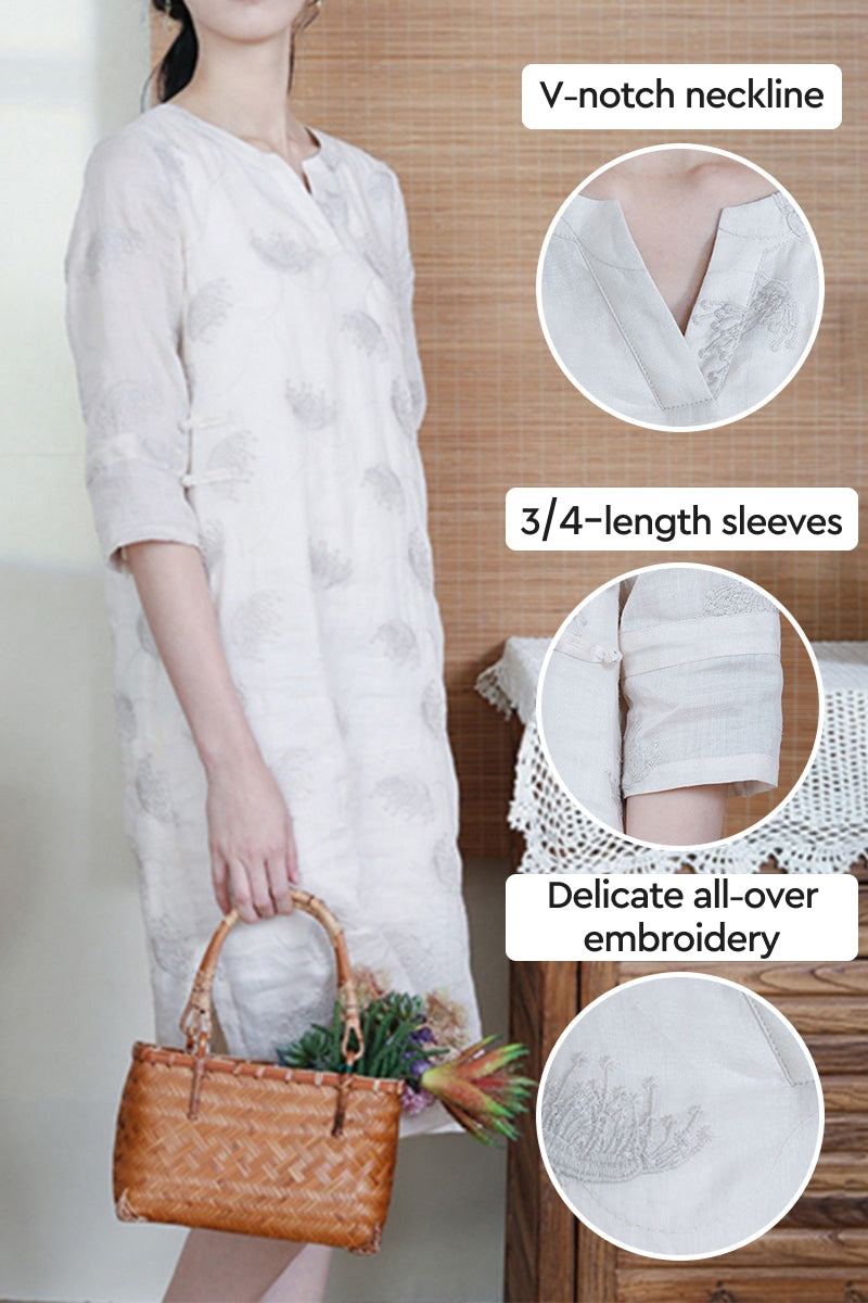100% linen dress with V-notch neckline, 3/4-length sleeves, and delicate all-over embroidery in white