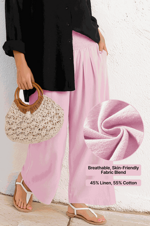 Woman wearing Oversized Linen Leaved-IN Set with black linen-blend shirt and pink flowy palazzo pants showcasing breathable linen-cotton fabric blend.