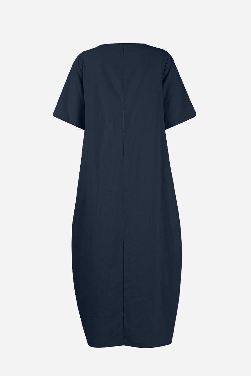 Navy Breeze Cocoon Dress with relaxed fit, rolled sleeves, deep pockets, and linen-like fabric.