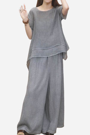 Woman wearing grey Provence Cotton Linen blend layered top and wide-leg trousers set