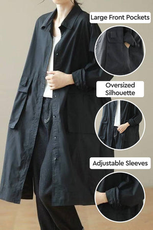 Nomad Ease Oversized Shirt-Jacket with large pockets, adjustable roll-up sleeves, and relaxed silhouette in black.