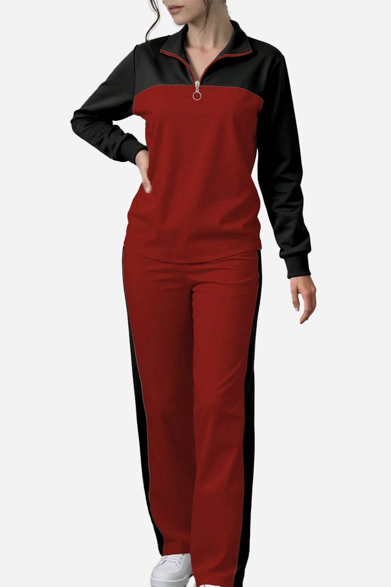 Woman wearing red and black Colorblock Comfort Leisure Set with half-zip top and wide-leg pants