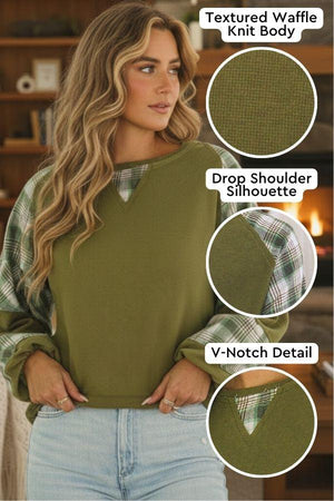 Waffle knit sweatshirt with textured body, plaid sleeves, drop shoulder fit, and V-notch detail in olive green