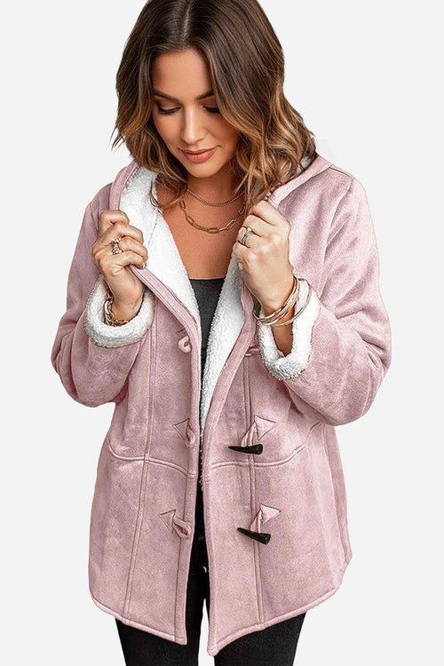 Women's warm toggle button hooded coat with soft faux suede exterior and plush sherpa lining in pink.