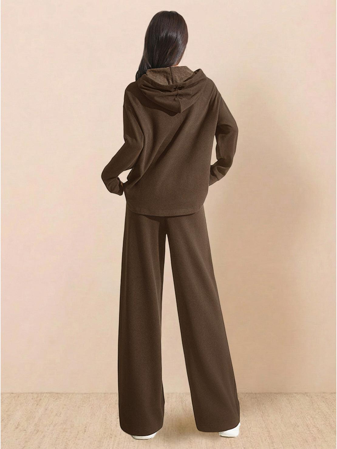 Woman wearing brown lyocell-blend hooded set with wide-leg pants viewed from back