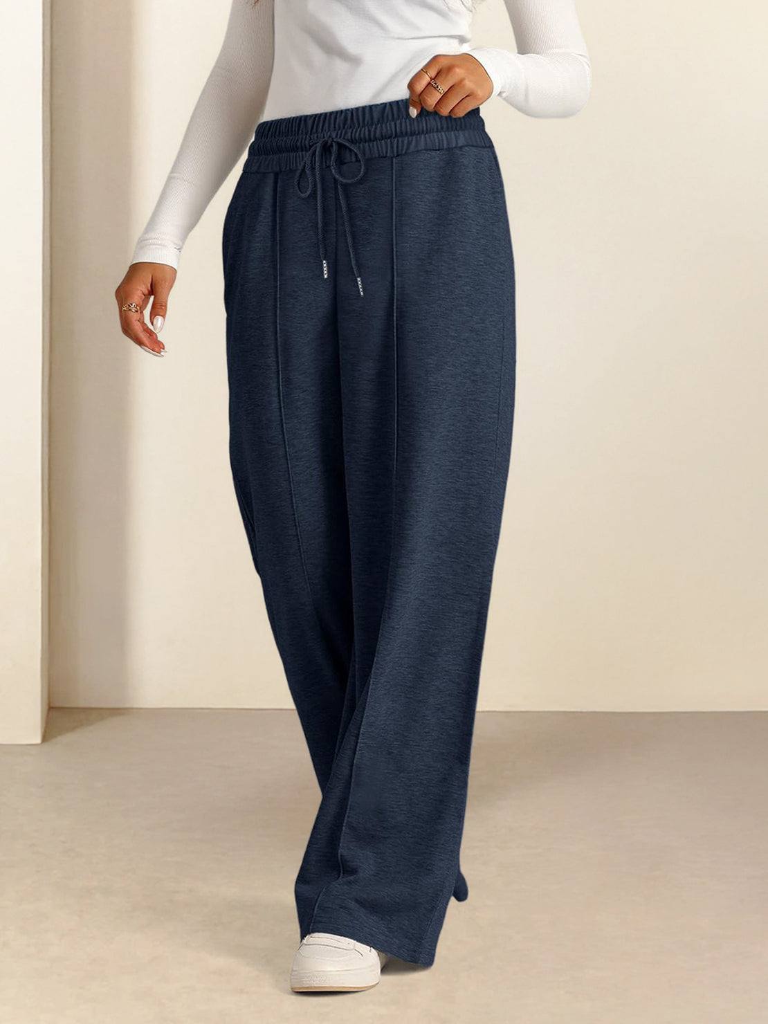 Soft knit wide-leg pants in breathable fabric with elastic drawstring waist and side pockets