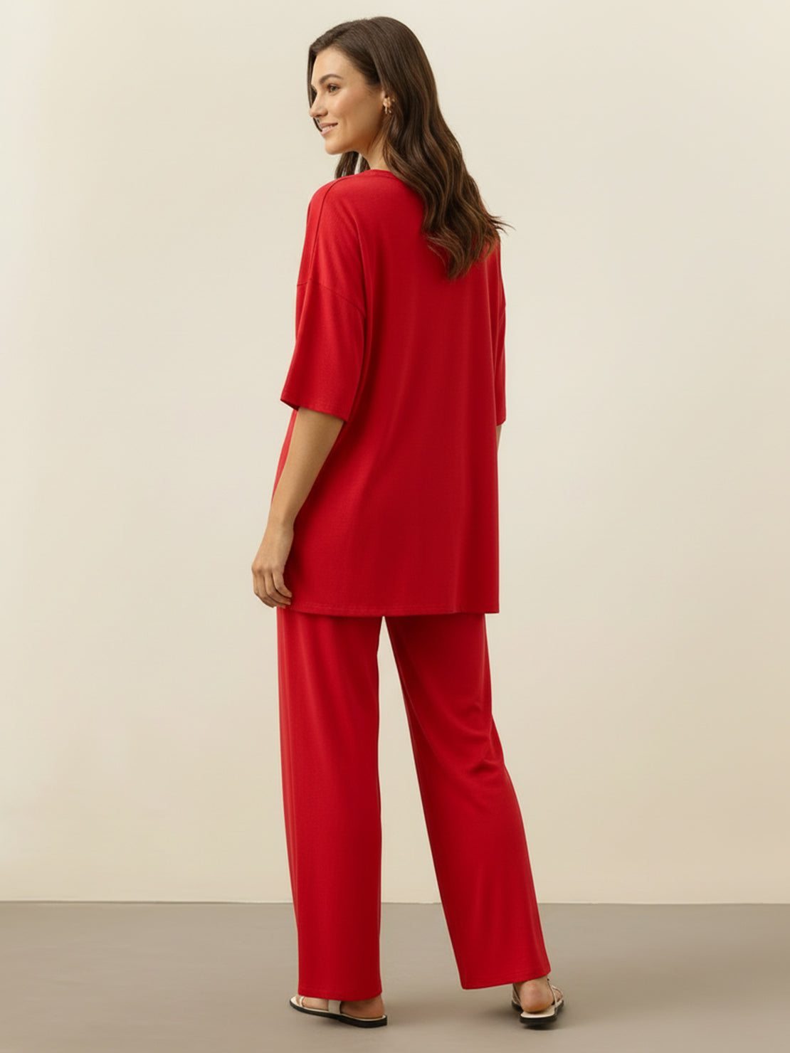 Oversized long-line loungewear set with pullover and wide-leg pants in soft knit fabric