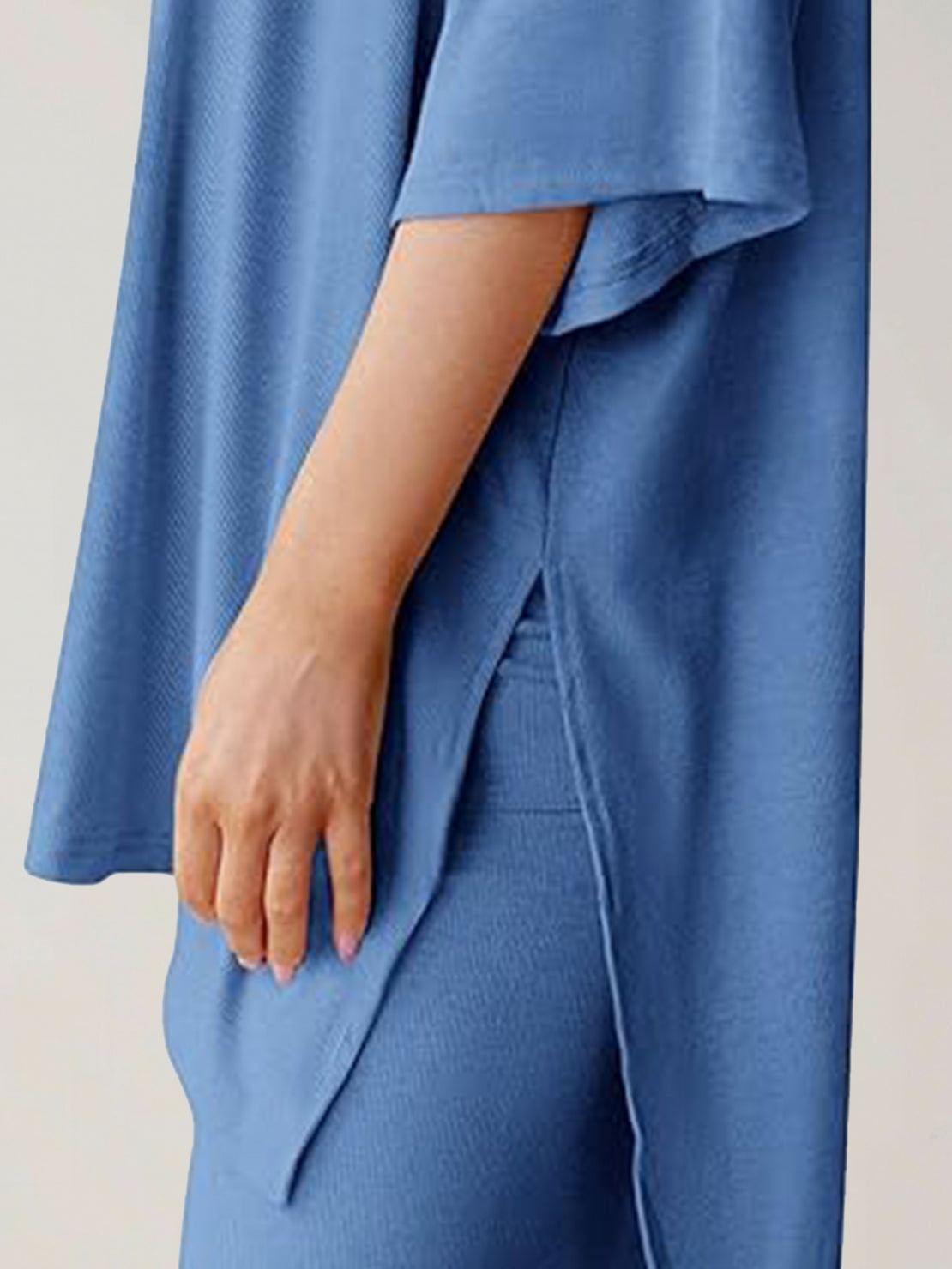 Oversized long-line loungewear set with oversized pullover and straight-leg pants in soft knit fabric