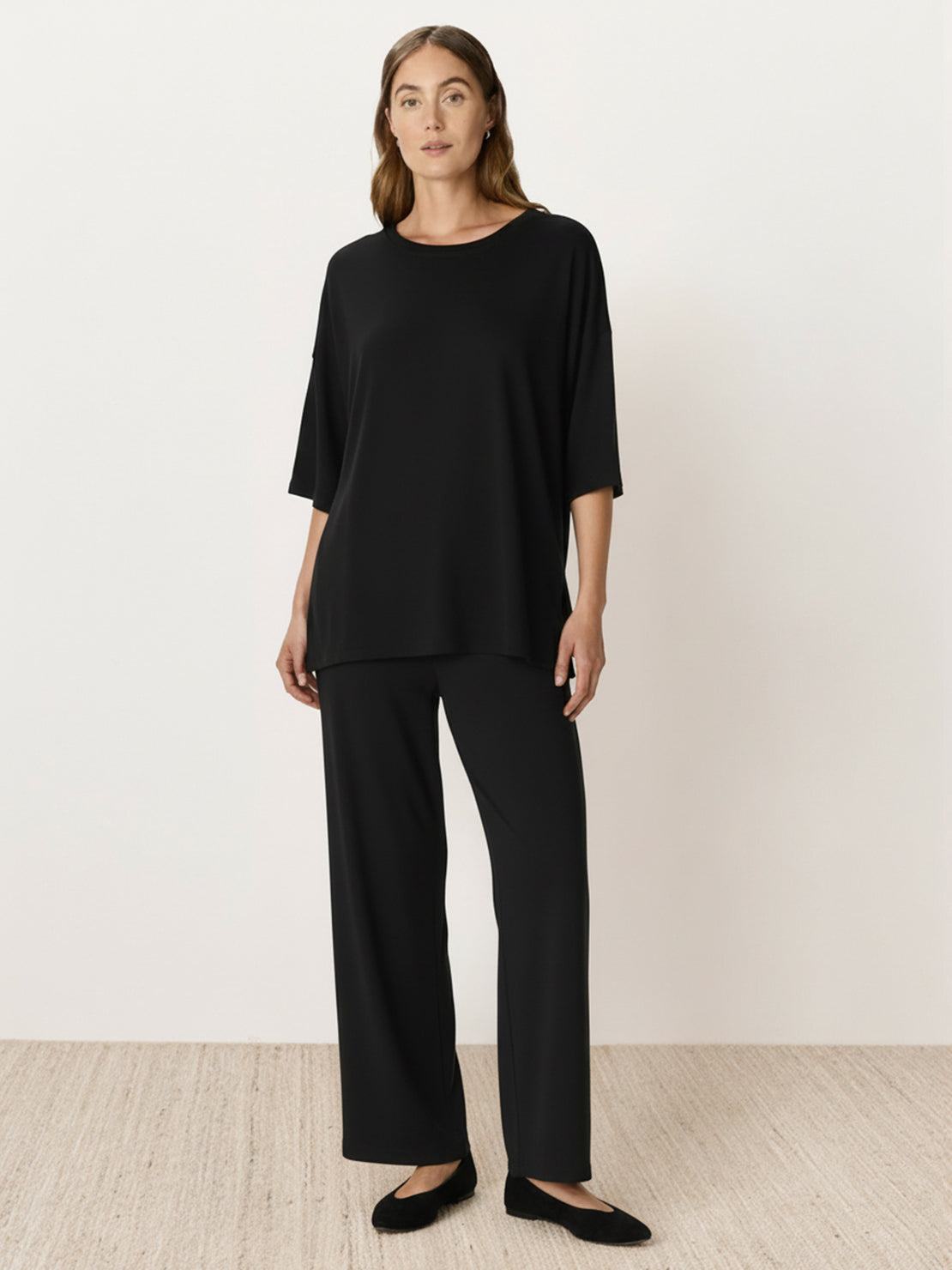 Oversized long-line loungewear set with short-sleeve pullover and wide-leg pants in soft knit fabric