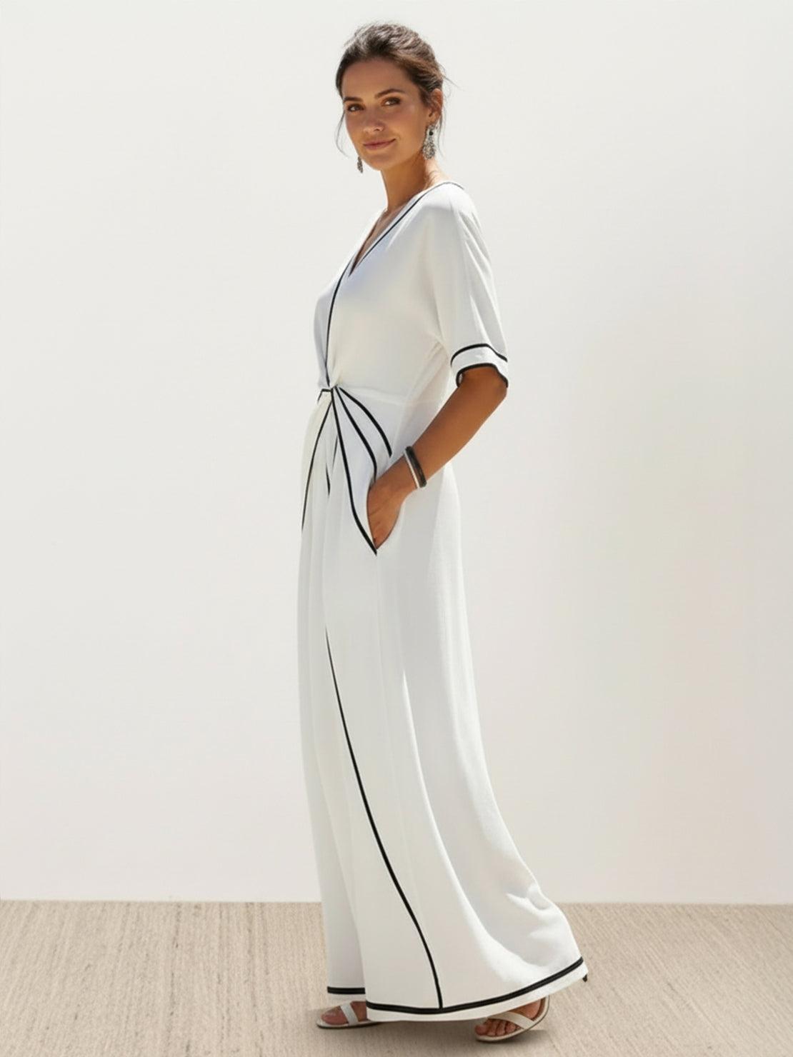 Black knot-waist maxi dress with V-neckline and flowing skirt