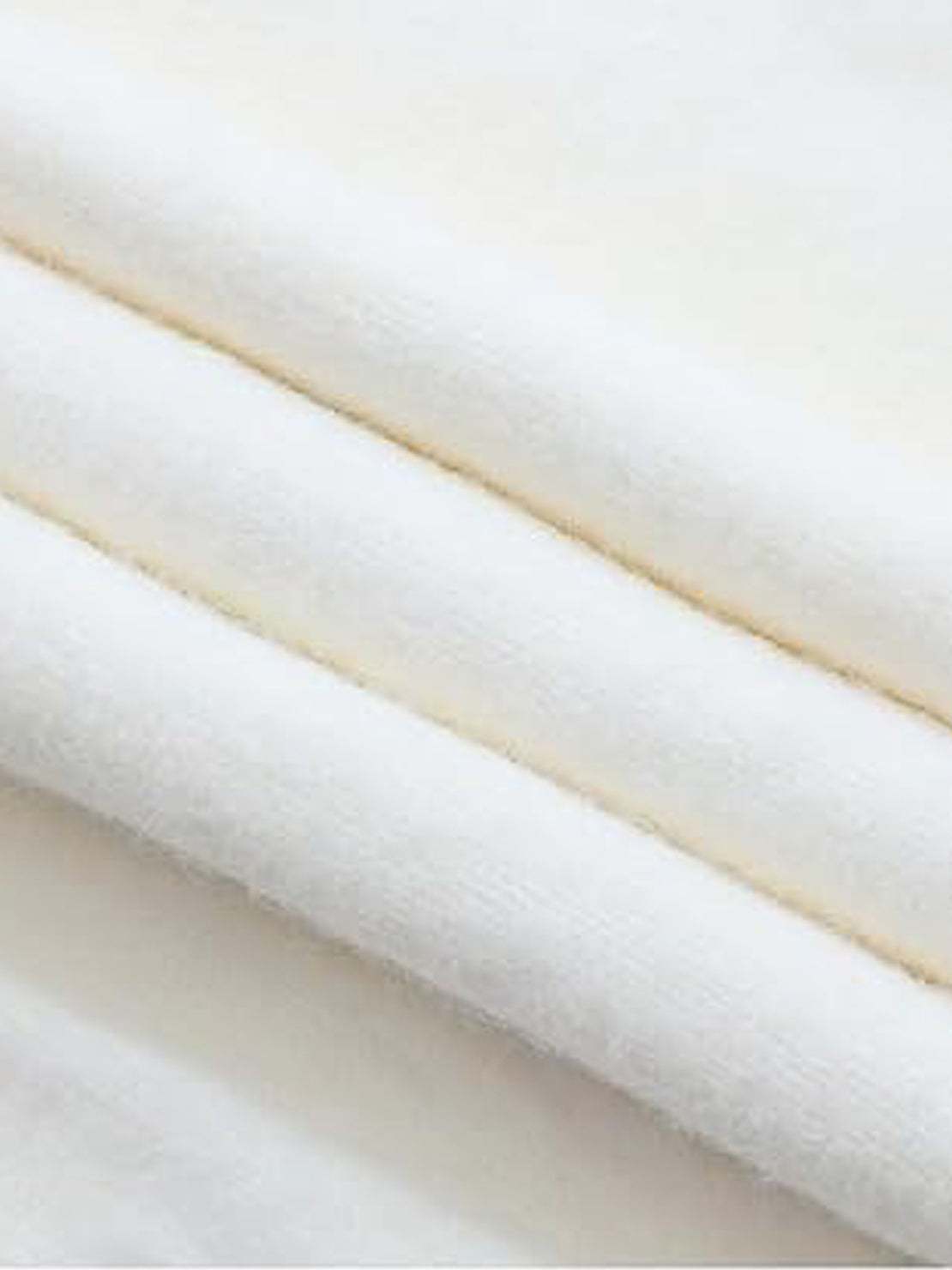 Oversized cable-knit crewneck sweater with dropped shoulders and ribbed trim in thick, plush fabric