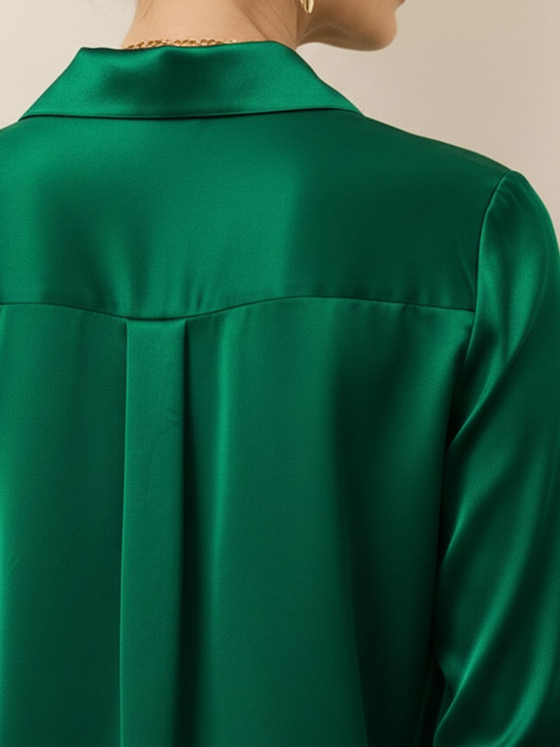 Silk-finish button front shirt with smooth fabric, traditional collar, and relaxed fit