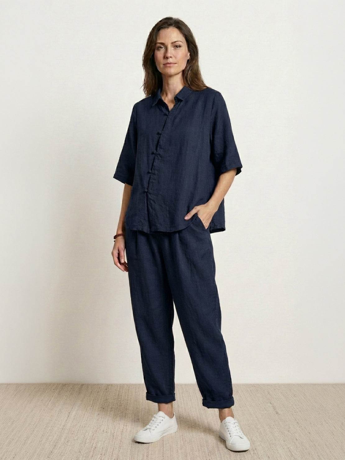 100% cotton artisan two-piece set with oversized button-front shirt and wide-leg cropped pants