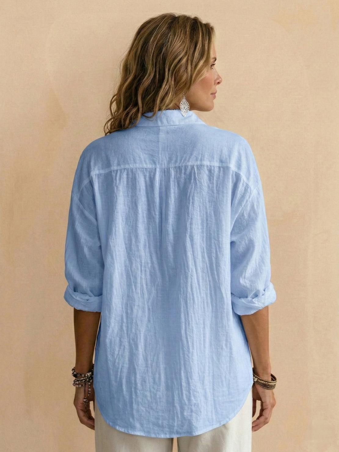Lightweight 100% cotton popover blouse with relaxed fit, classic collar, and tunic length