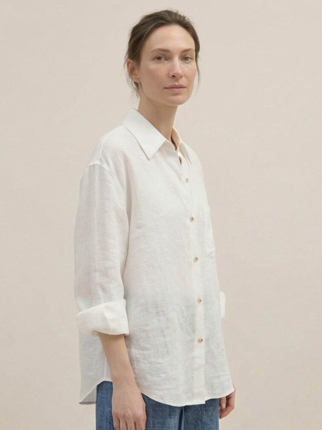 100% linen oversized dropped-shoulder shirt with long rollable sleeves and side slits in white
