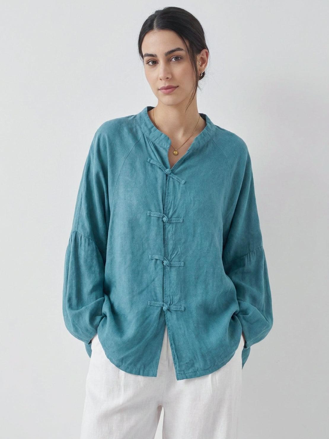 Oversized linen-cotton blouse with batwing sleeves and frog button closures
