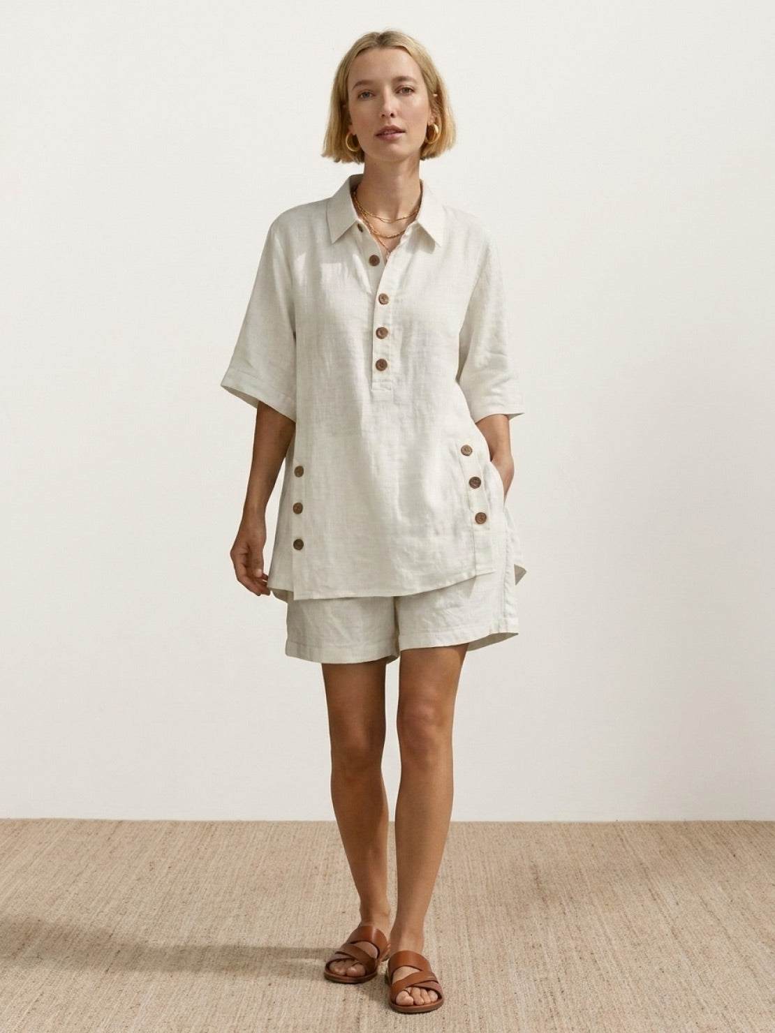 100% cotton beige oversized button-front co-ord set with relaxed shorts and decorative side buttons