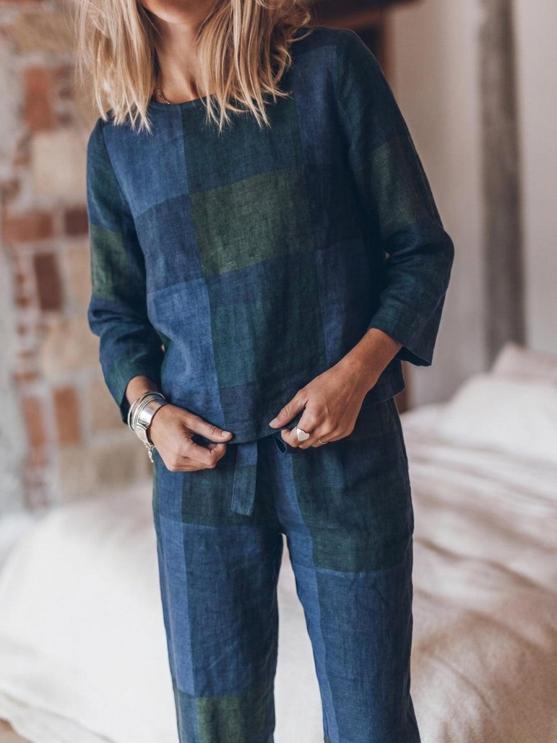 Woman wearing cotton-linen monochrome relaxed longline top and wide-leg pants set