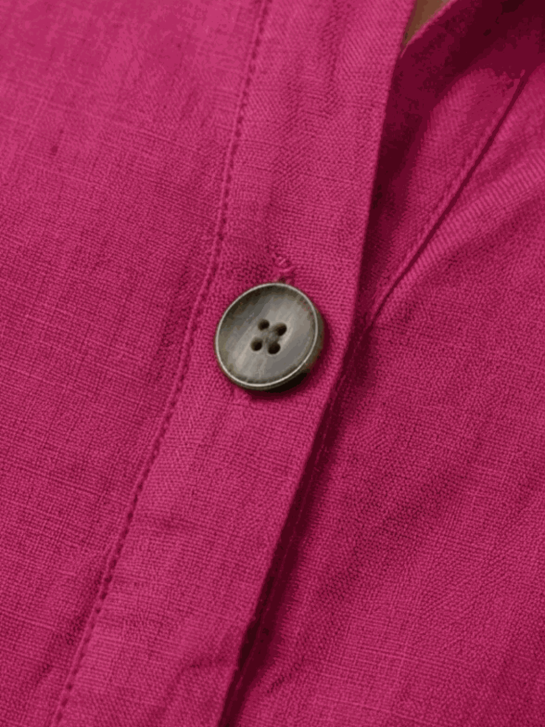 White pure linen age-defying shirt with button detail on mannequin