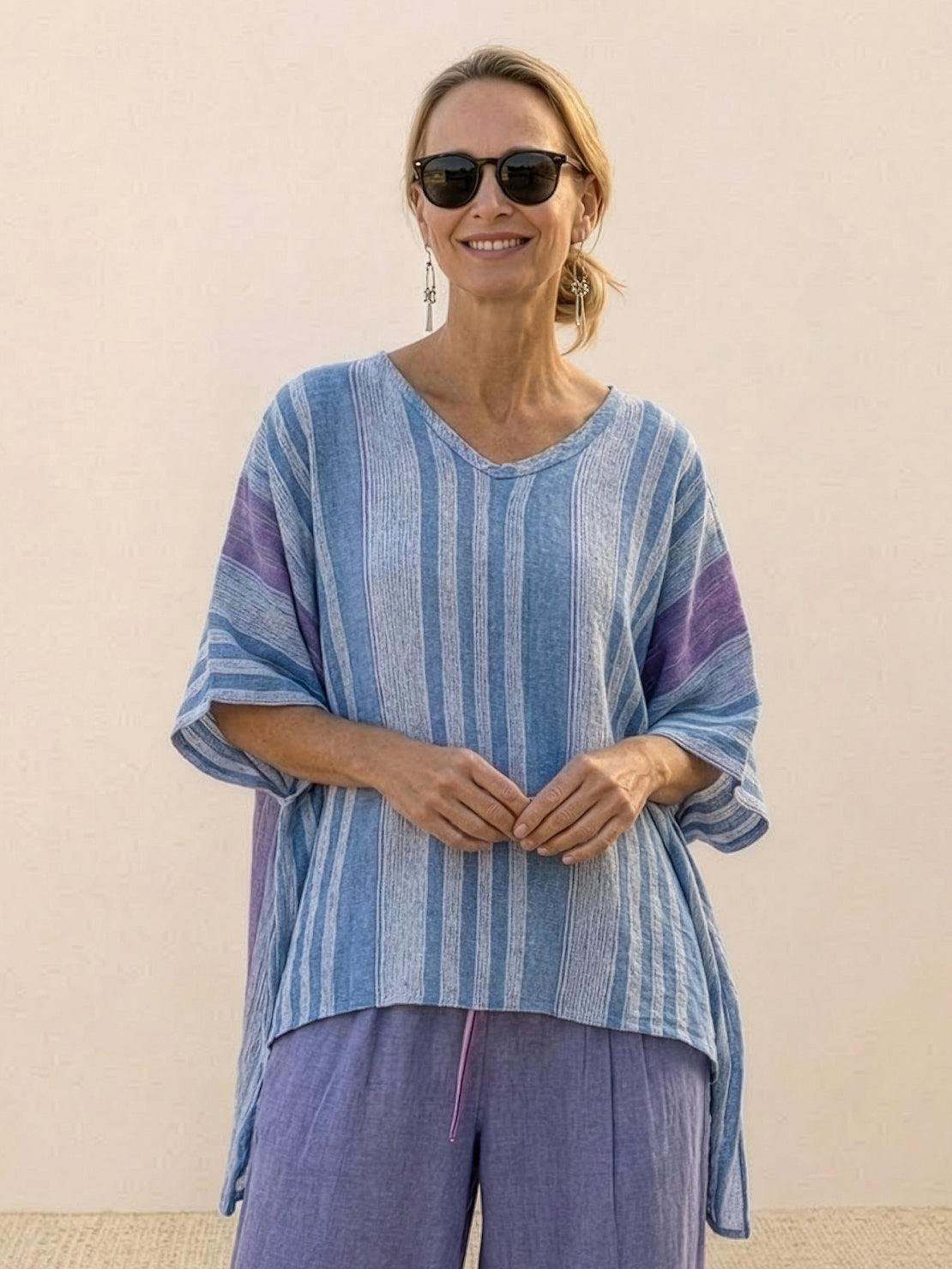 Coastal Comfort Linen two-piece set with lace details and breathable fabric on white background