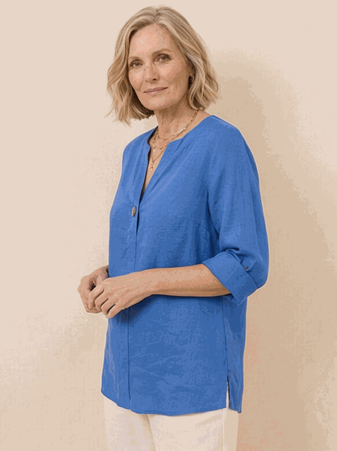 white pure linen age-defying shirt with button details on hanger