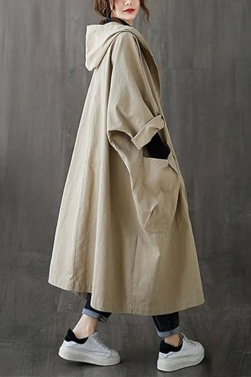 Oversized beige water resistant windbreaker jacket with hood and large front pockets