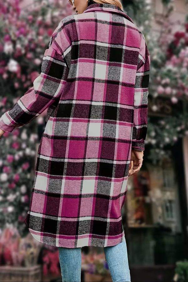 Oversized medium-length plaid overshirt in pink and black plaid pattern, cozy wool blend layer.