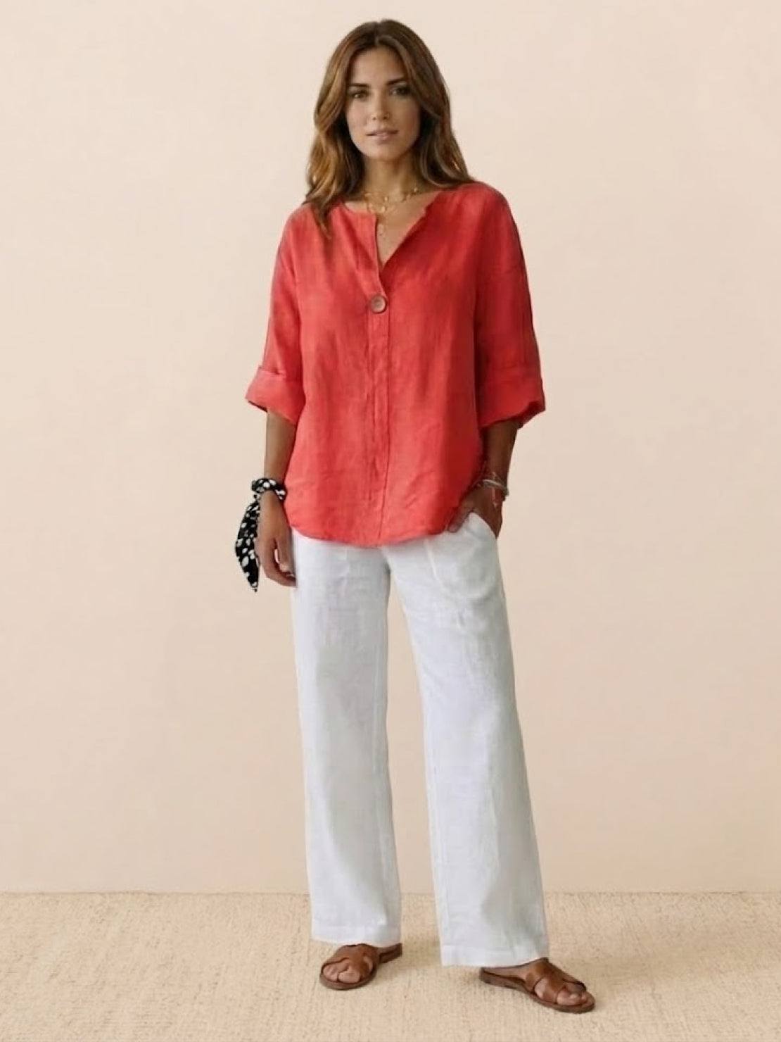 white pure linen age-defying shirt with button details on hanger