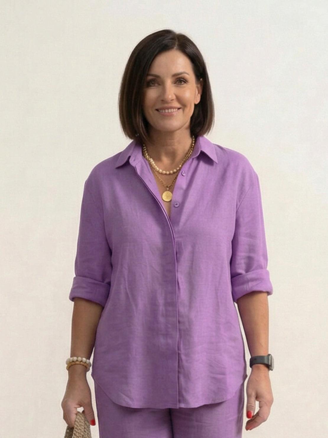 woman wearing relaxed shirt and trousers two-piece set standing outdoors