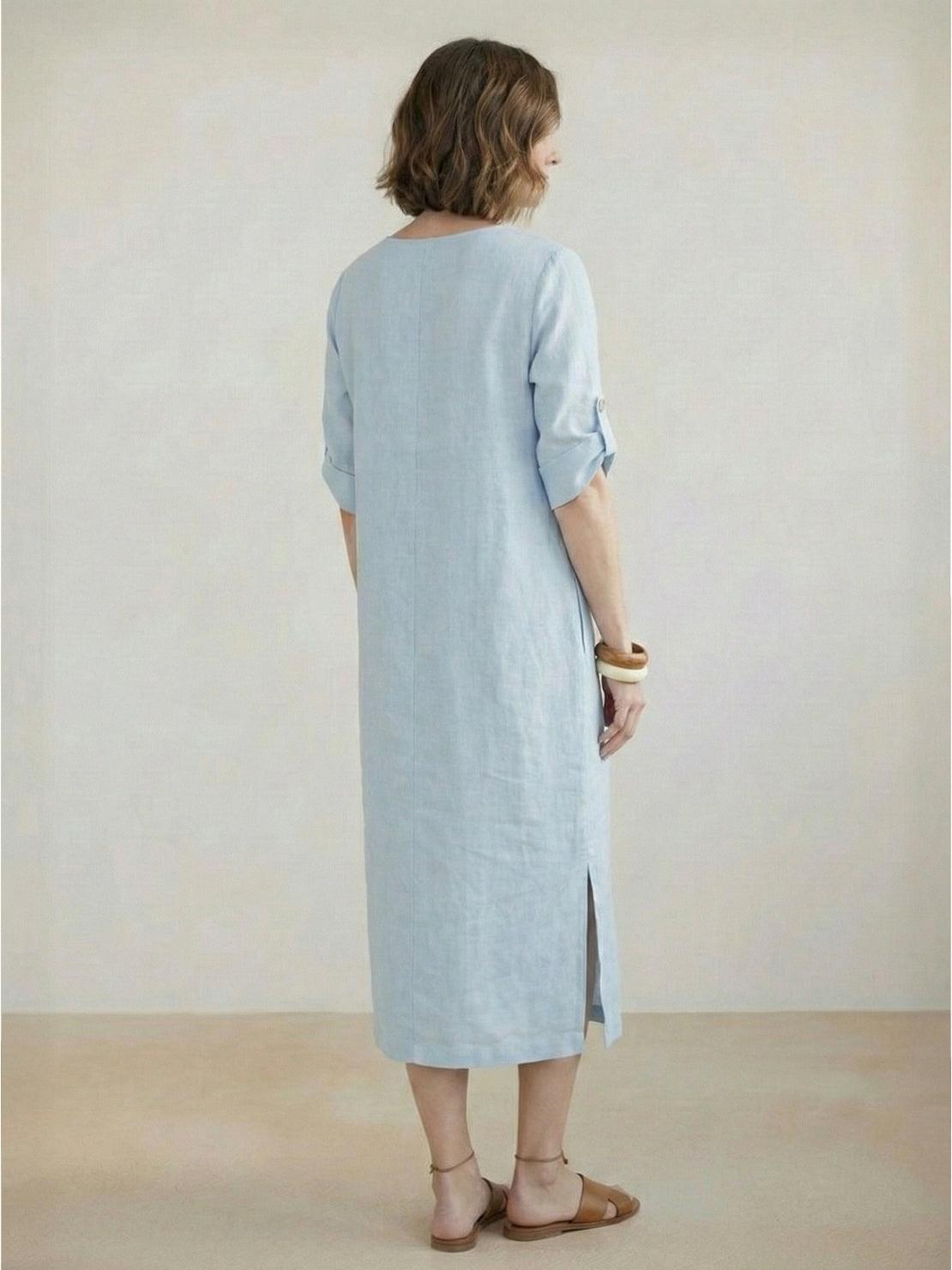 Woman wearing Pure Cotton Elegance dress in soft, breathable fabric perfect for all seasons