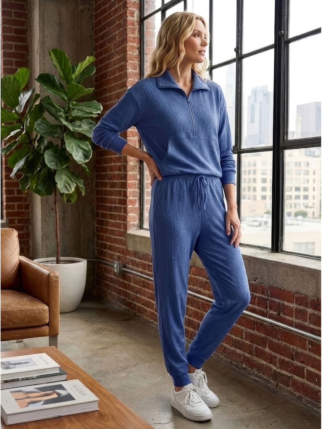 Unisex half-zip pullover and sweatpants set in soft fabric for casual comfort and relaxed fit