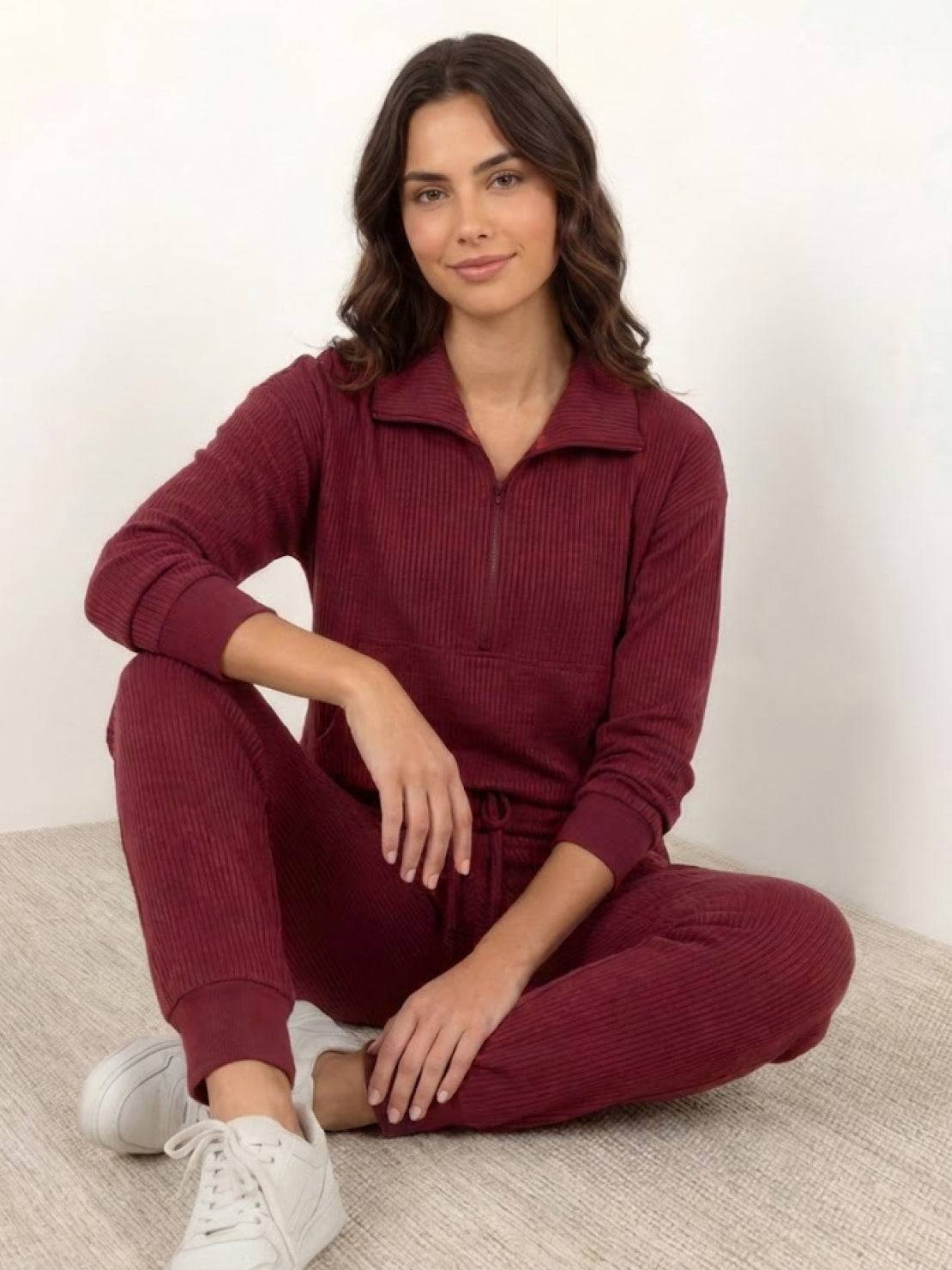 Unisex half-zip pullover and sweatpants set in soft fabric for casual comfort and travel