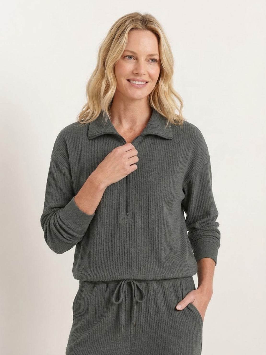 Unisex half-zip pullover and matching sweatpants set for casual comfort and travel