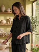 100% cotton oversized two-piece set with button-front shirt and wide-leg pants in natural crinkle texture