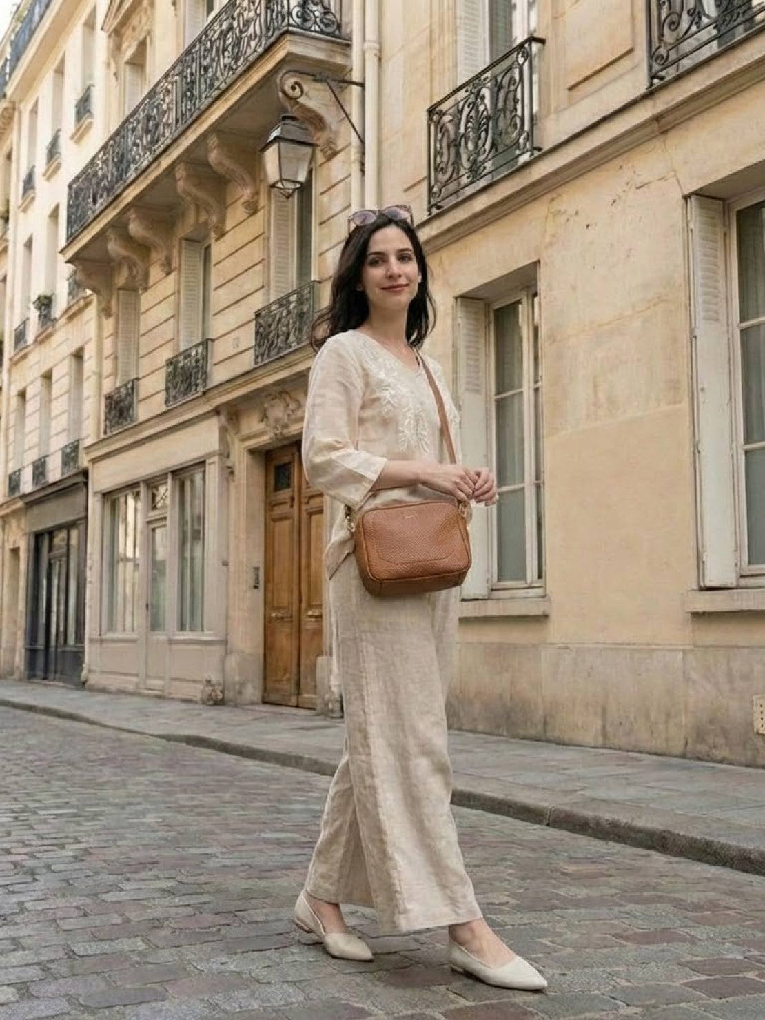 Elegant women's golden hour set in premium cotton linen blend with embroidered V-neck top and wide-leg trousers