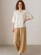 Elegant 100% cotton linen blend golden hour set with embroidered top and flowing trousers