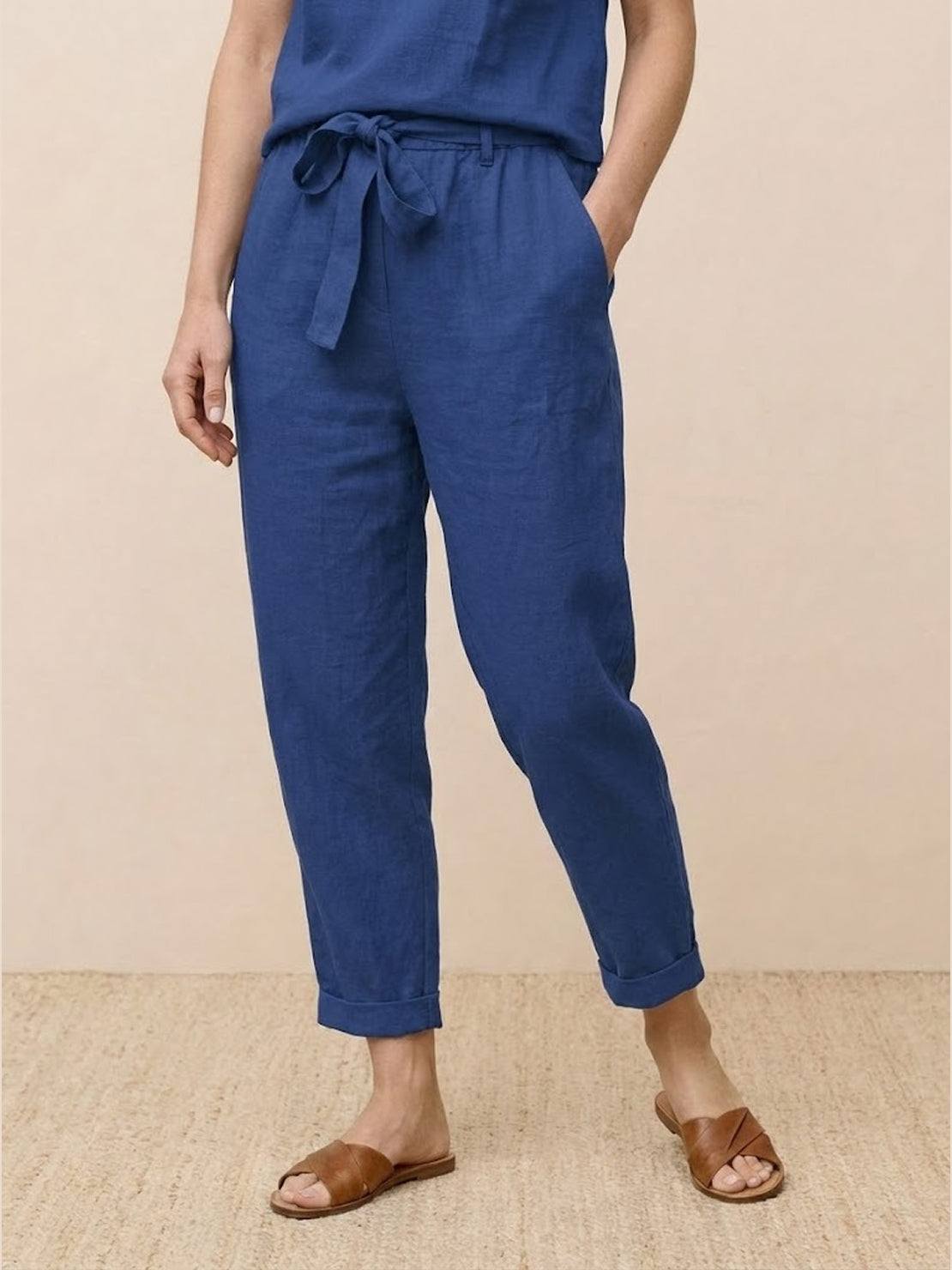 Straight-leg cotton linen monochrome pants with adjustable drawstring waist and natural textured fabric