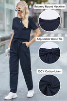 Woman wearing navy blue cotton linen set with relaxed round neckline and adjustable waist tie