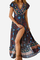 Bohemian floral print wrap dress with V-neck and high slit in blue floral cotton fabric